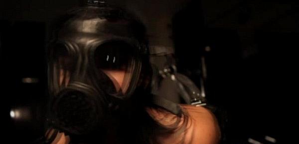 Lezdom mistress restrains her masked sub